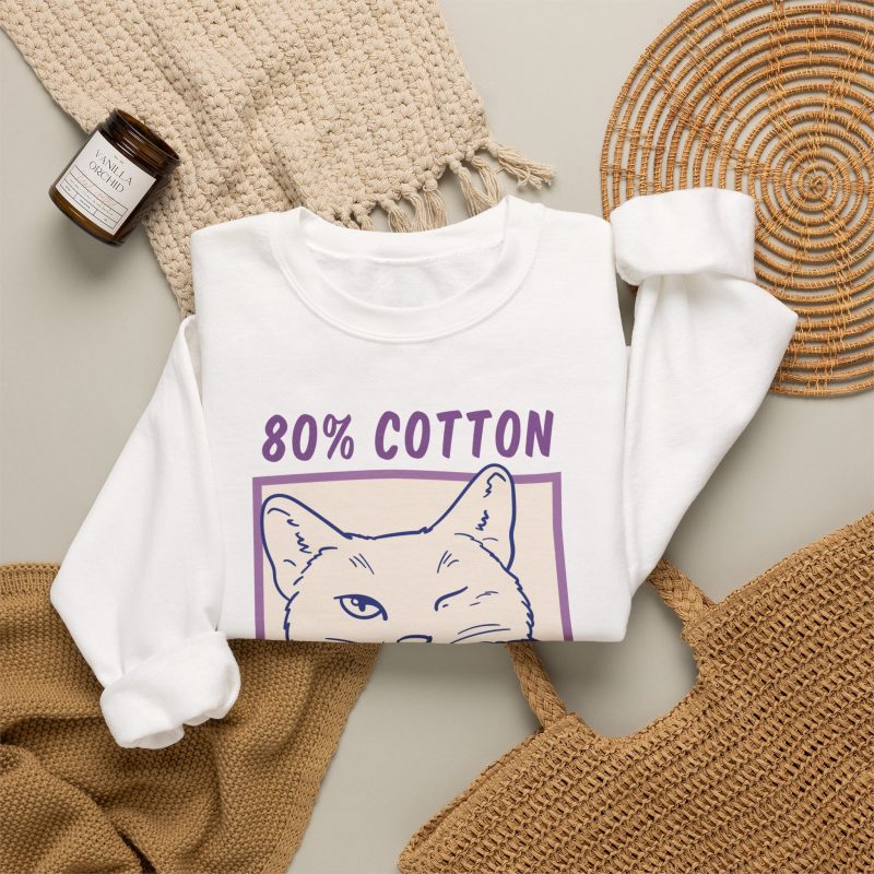 A winking white cat drawn in blue inside a cream square with purple lettering in the front print