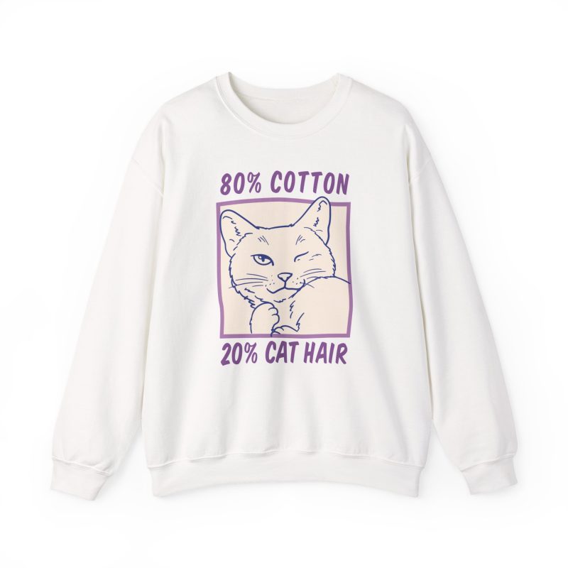 Front of the crewneck sweatshirt showing a winking white cat drawn in blue inside a cream square with purple lettering