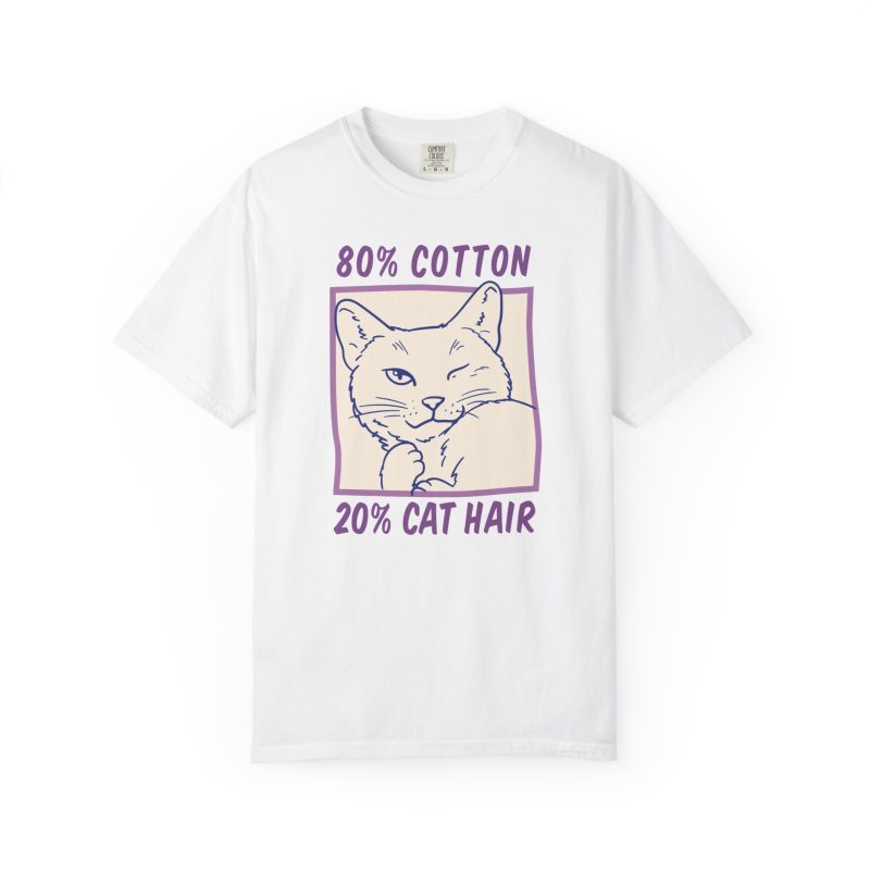 Front of the tee showing a winking white cat drawn in blue inside a cream square with purple lettering