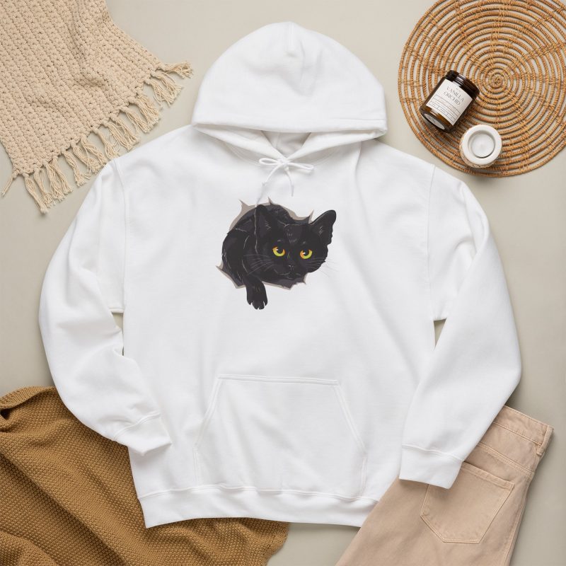 An illustrated black cat with yellow-green eyes and a paw reaching through a gray torn-hole effect in the front print