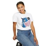 Person wearing a tee with an unimpressed blue cat beside large pink lettering and a black comic speech bubble printed on the front