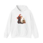 Front of the hoodie showing a brown cat in an orange witch hat beside a skull, lit candle and stacked spell books