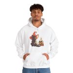 Person wearing a hoodie with a brown cat in an orange witch hat beside a skull, lit candle and stacked spell books printed on the front