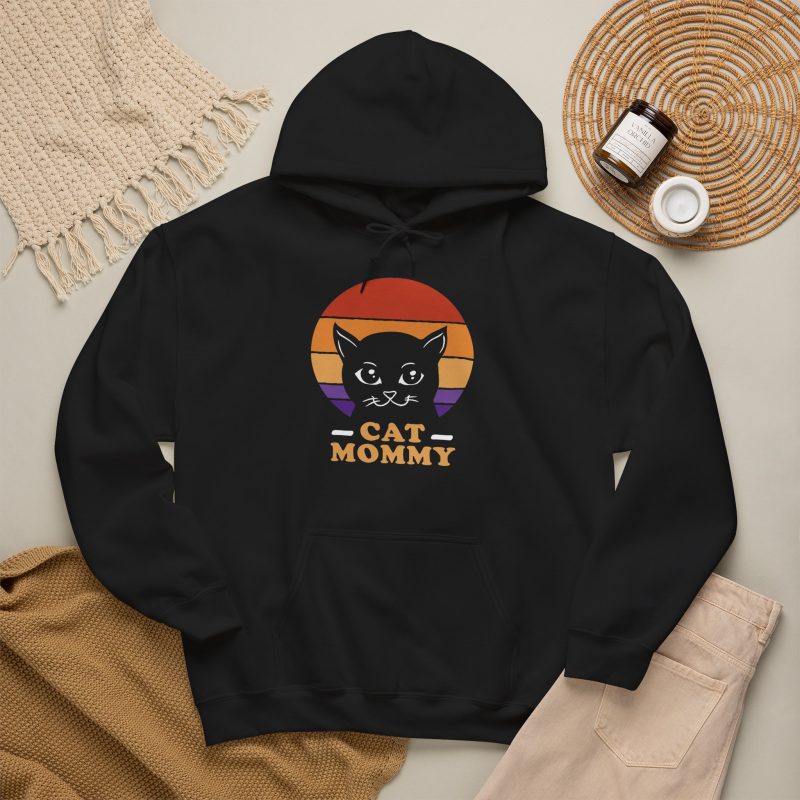 A cat face inside red, orange and purple sunset stripes above warm orange lettering in the front print