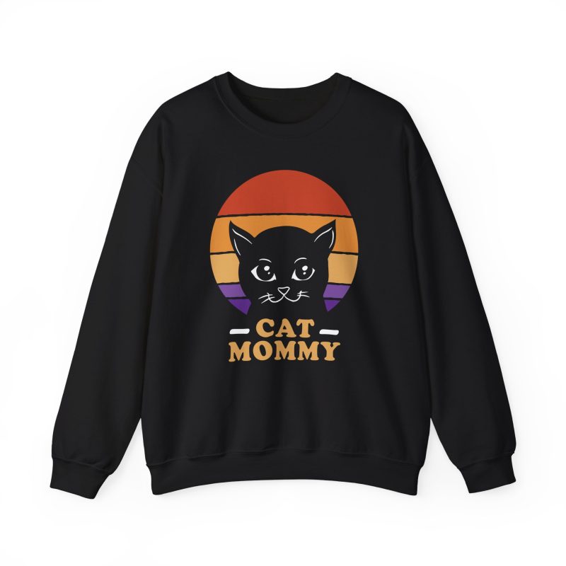 Front of the crewneck sweatshirt showing a cat face inside red, orange and purple sunset stripes above warm orange lettering