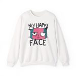 Front of the crewneck sweatshirt showing a pink and teal cat face and black lettering