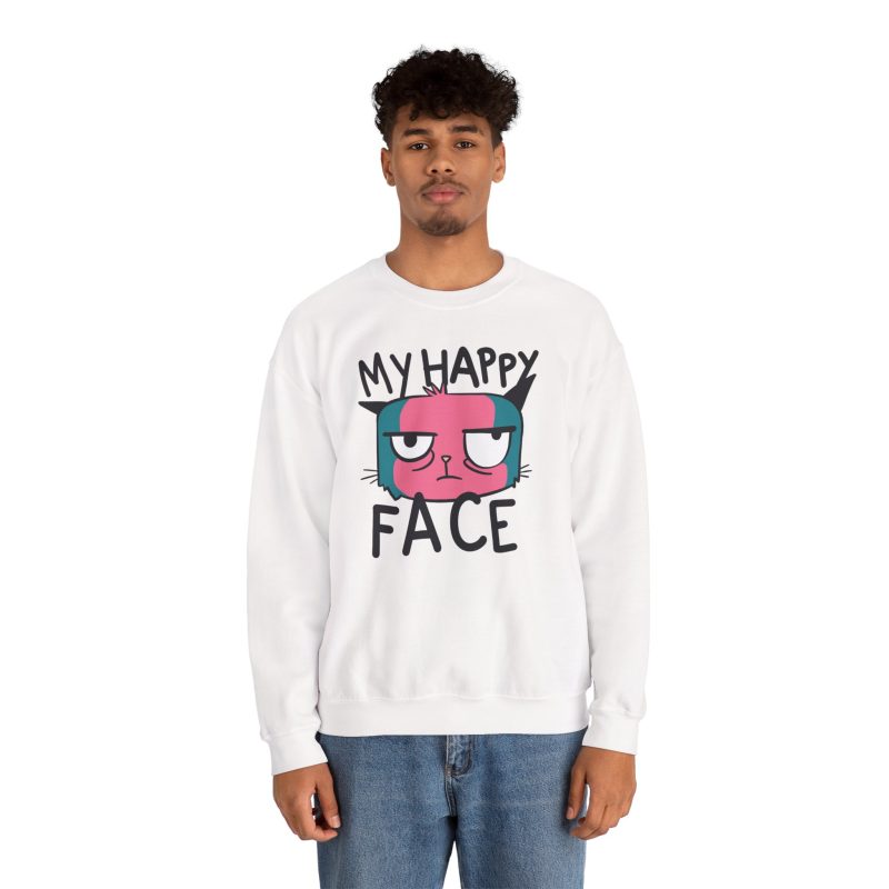 Person wearing a crewneck sweatshirt showing a pink and teal cat face and black lettering on the front