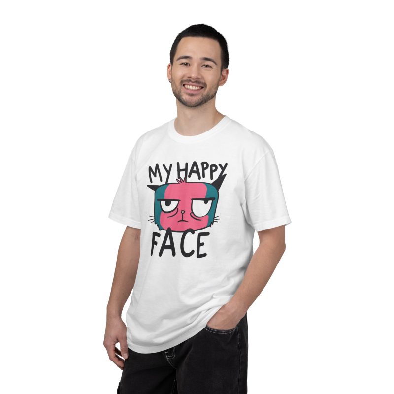 Person wearing a tee showing a pink and teal cat face and black lettering on the front