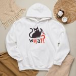 Wide-eyed black cat with a curled tail and kitchen knife beside black and orange WHAT? lettering in the front print