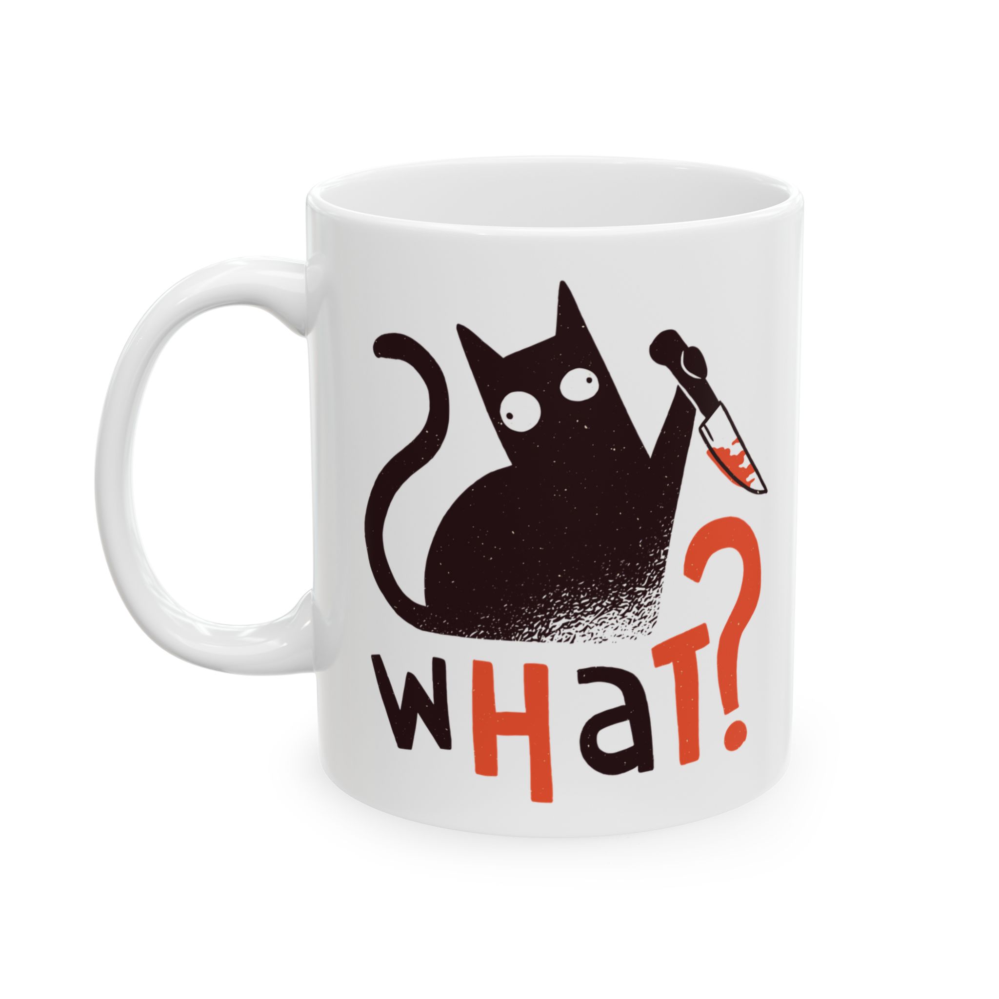 White ceramic mug showing a wide-eyed black cat with a kitchen knife and black and orange lettering