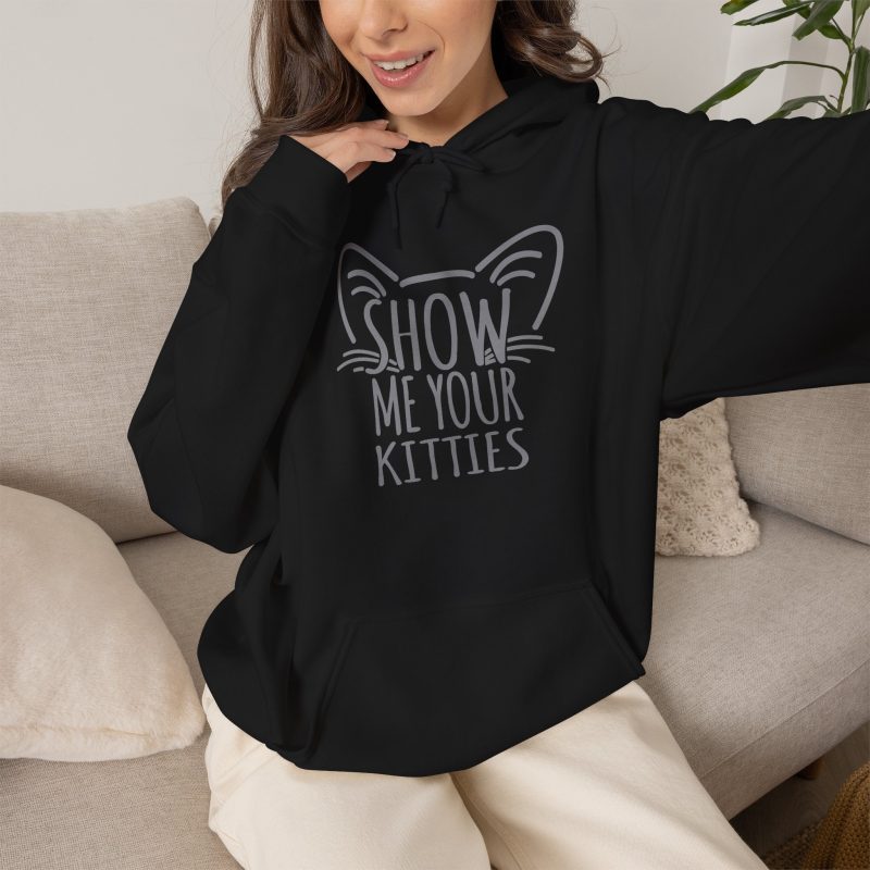Person wearing a hoodie showing gray cat-ear and whisker lettering on the front