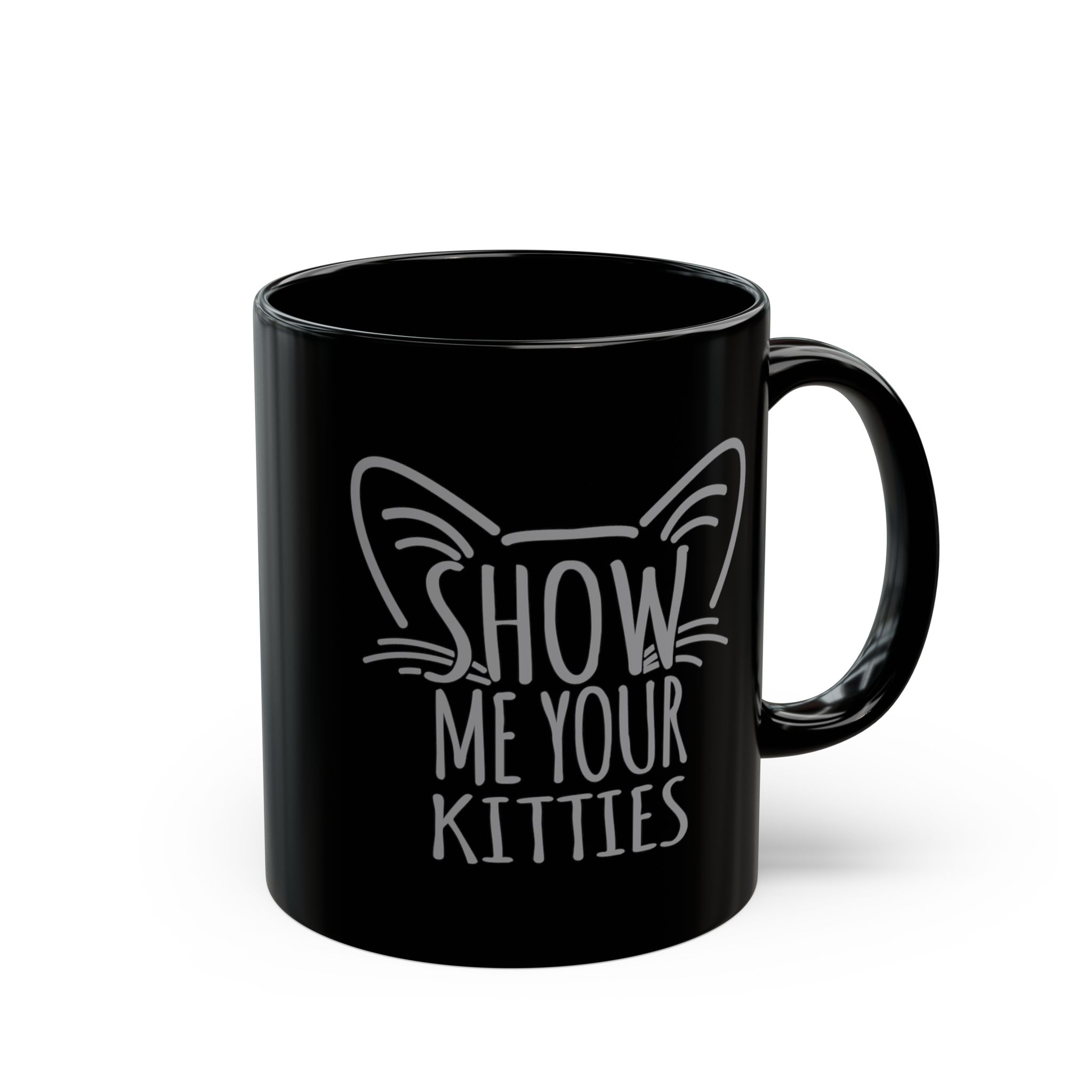 Glossy black ceramic mug showing gray cat-ear and whisker lettering
