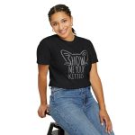 Person wearing a tee showing gray cat-ear and whisker lettering on the front Person wearing a tee showing gray cat-ear and whisker lettering on the front
