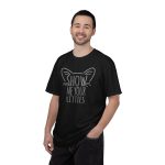 Person wearing a tee showing gray cat-ear and whisker lettering on the front Person wearing a tee showing gray cat-ear and whisker lettering on the front