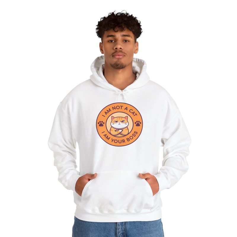 Person wearing a hoodie with an unimpressed ginger tabby with crossed arms inside an orange badge with dark purple lettering and two paw prints printed on the front