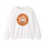 Front of the crewneck sweatshirt showing an unimpressed ginger tabby with crossed arms inside an orange badge with dark purple lettering and two paw prints Front of the crewneck sweatshirt showing an unimpressed ginger tabby with crossed arms inside an orange badge with dark purple lettering and two paw prints