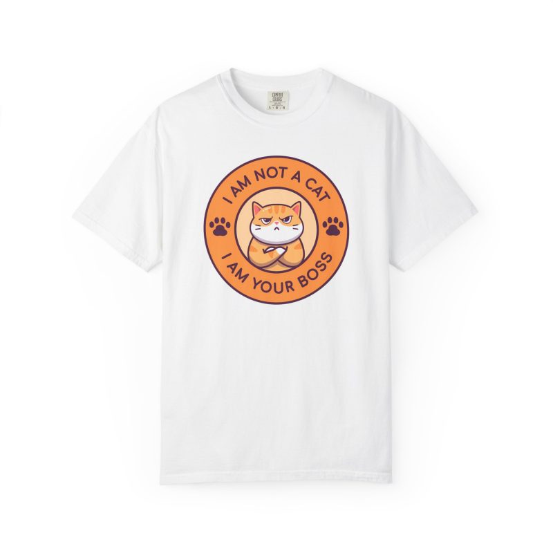Front of the tee showing an unimpressed ginger tabby with crossed arms inside an orange badge with dark purple lettering and two paw prints