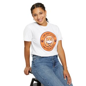 Person wearing a tee with an unimpressed ginger tabby with crossed arms inside an orange badge with dark purple lettering and two paw prints printed on the front