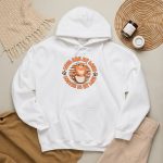 Detail of the hoodie's orange tabby in a cream coffee cup, paw prints and circular lettering