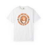Front of a white cats and coffee tee with an orange tabby and circular lettering