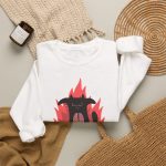 A black cat with a brain on its belly and pink flames with I Am Very Hungry lettering A black cat with a brain on its belly and pink flames with I Am Very Hungry lettering