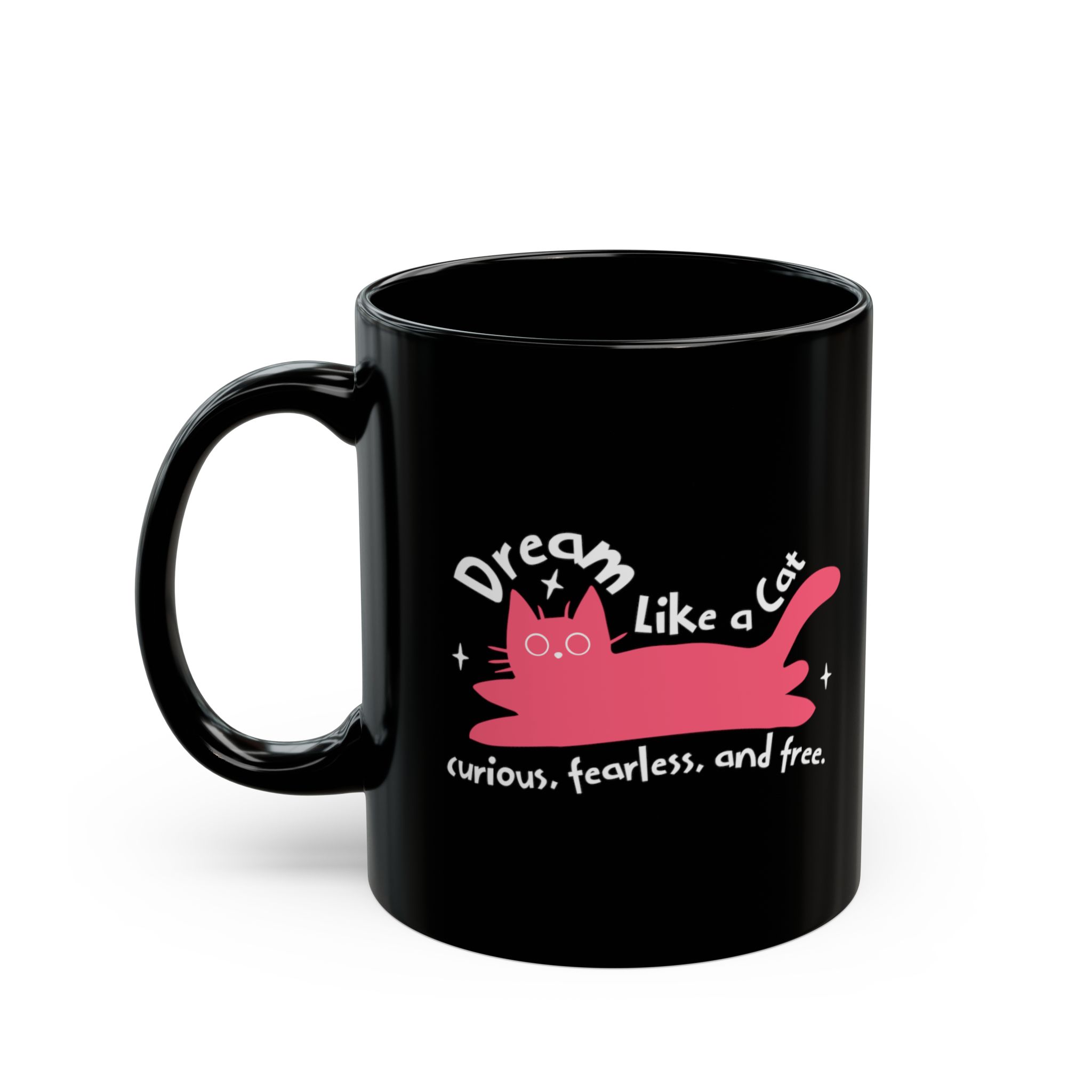 Glossy black ceramic mug showing a pink reclining cat with a raised tail, round eyes and white sparkles