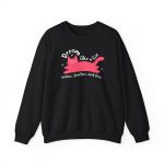 Front of the crewneck sweatshirt showing a pink reclining cat with a raised tail, round eyes and white sparkles
