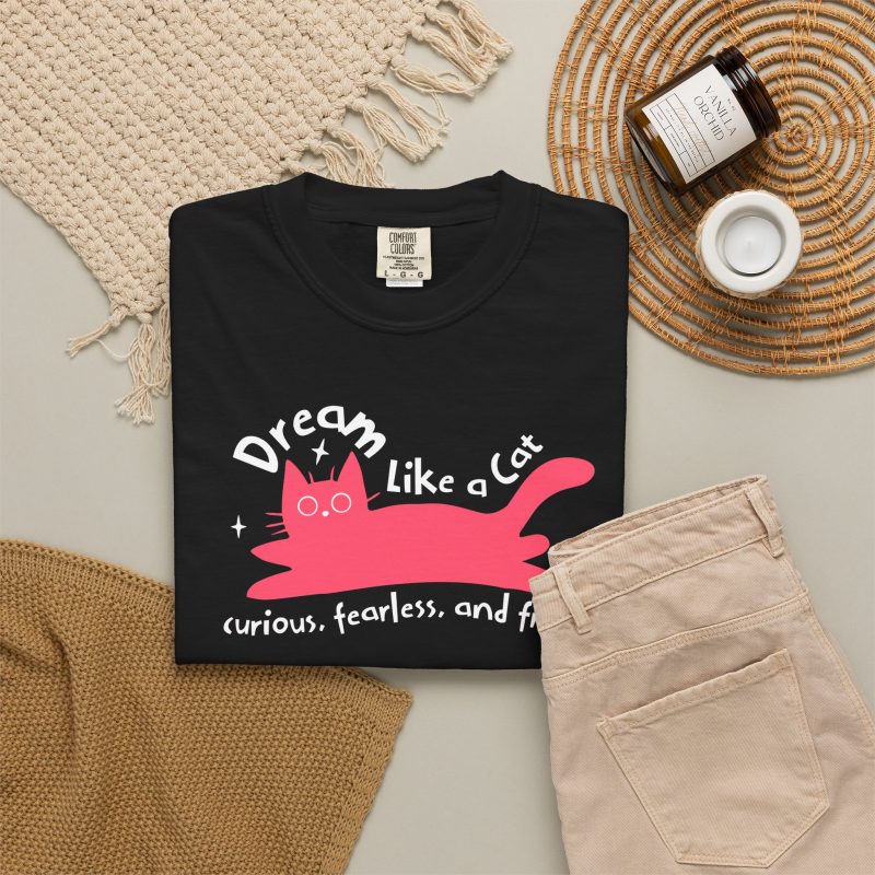 Pink reclining cat, white sparkles and curved Dream Like a Cat lettering in the front print