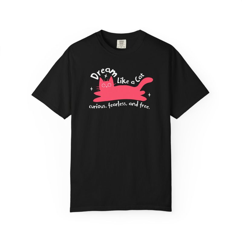 Front of the tee showing a pink reclining cat with a raised tail, round eyes and white sparkles