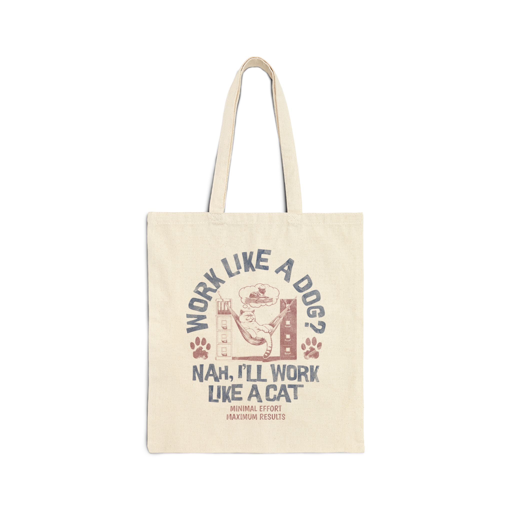 Front of the natural canvas tote showing a cat reclining in a hammock between filing cabinets with blue lettering and red paw prints