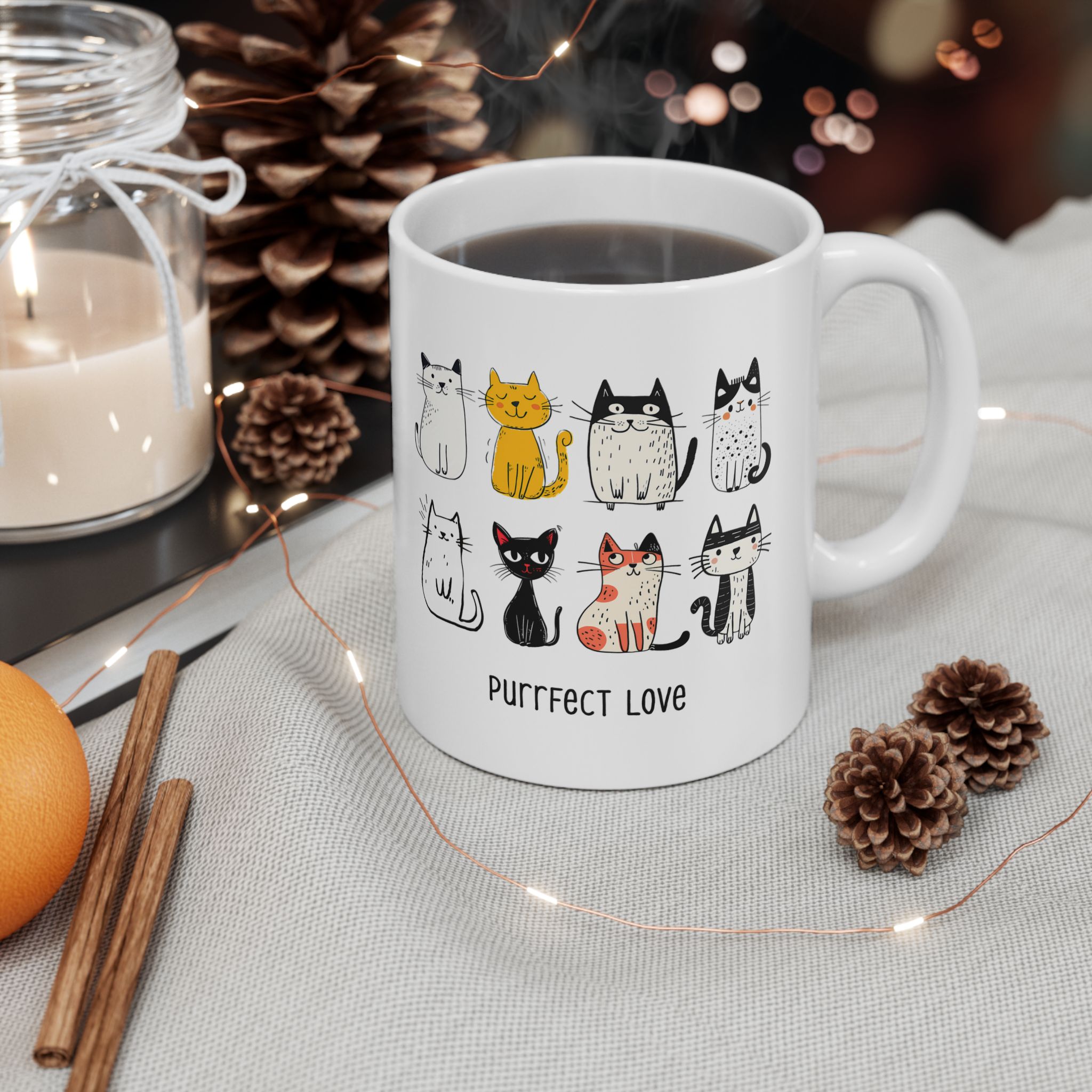 White ceramic mug showing eight line-drawn cats in two rows with different expressions and coat patterns