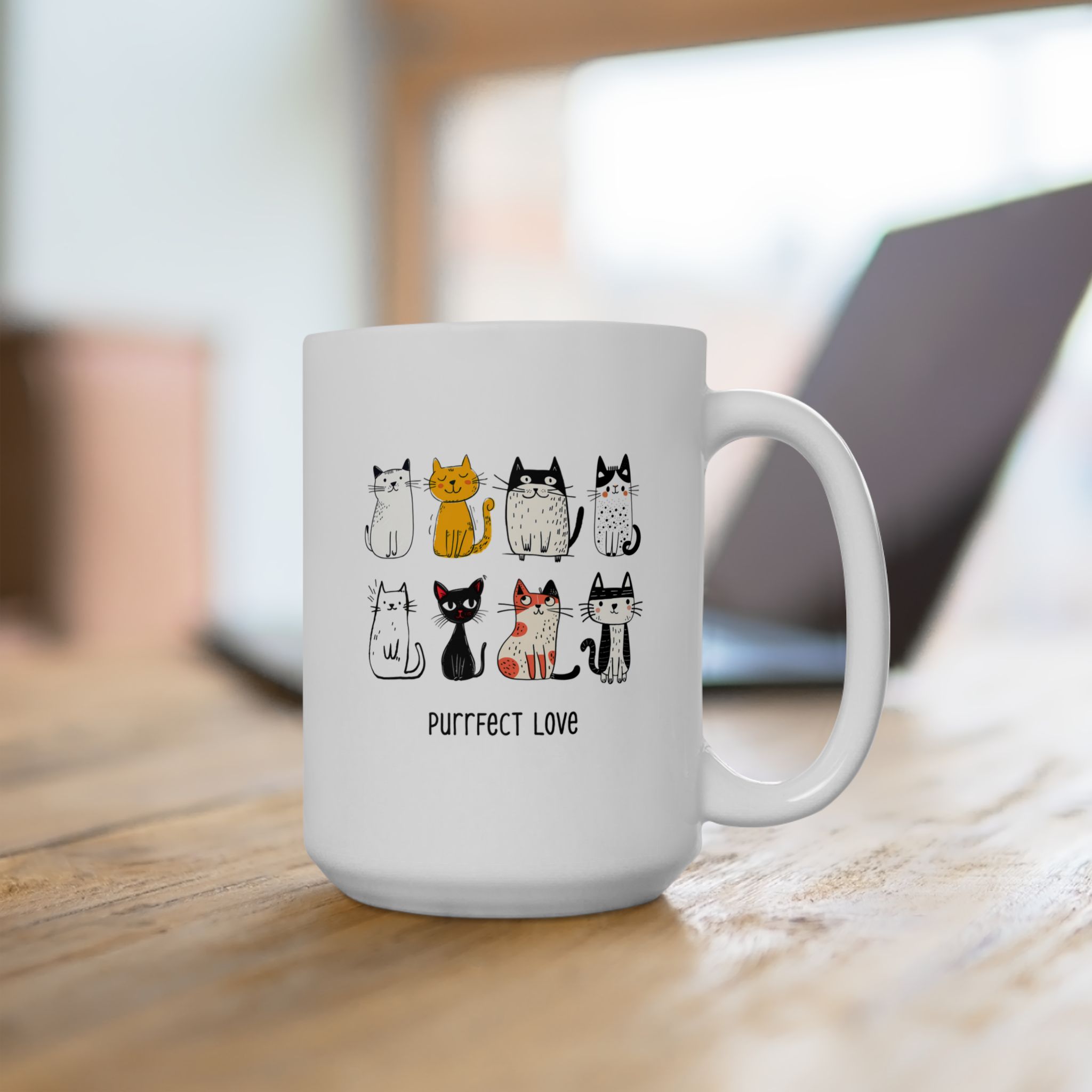 White ceramic mug showing eight line-drawn cats in two rows with different expressions and coat patterns