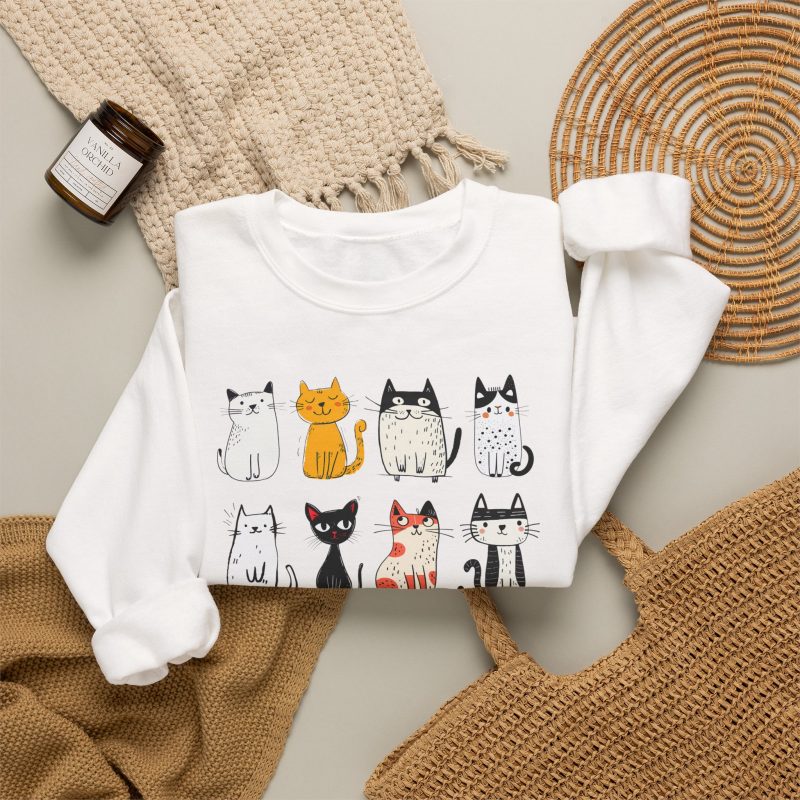 Eight line-drawn cats with assorted coat patterns above Purrfect Love lettering in the front print