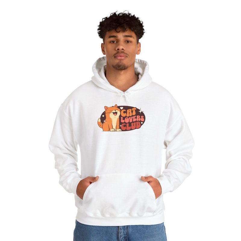 Person wearing a hoodie with a smiling orange tabby beside retro lettering in an oval badge with hearts and starbursts printed on the front