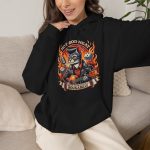 Person wearing a hoodie with a guitar-playing rockabilly cat Person wearing a hoodie with a guitar-playing rockabilly cat