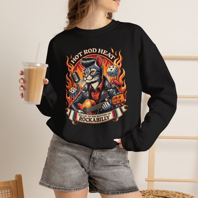 Person wearing a sweatshirt with a guitar-playing rockabilly cat