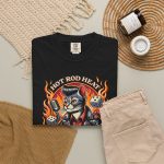 A guitar-playing cat with a pompadour, flames and dice with Hot Rod Heat lettering