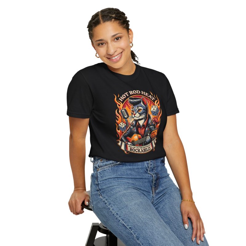 Person wearing a shirt with a guitar-playing rockabilly cat