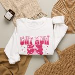 Pink kitten with oversized sunglasses, striped Cat Mom lettering, stars and a small flower in the front print