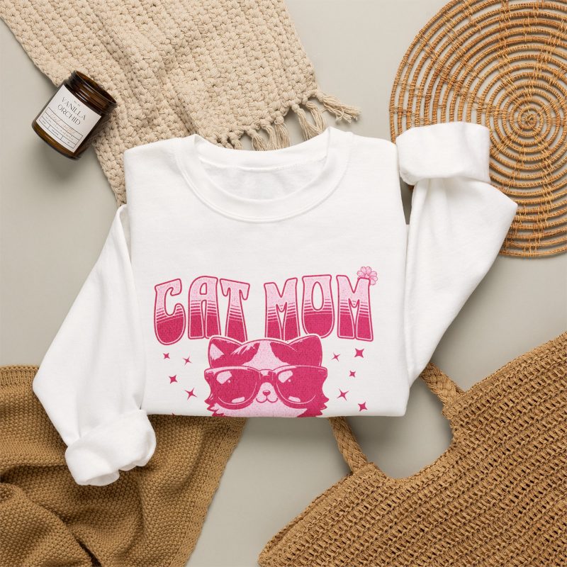 Pink kitten with oversized sunglasses, striped Cat Mom lettering, stars and a small flower in the front print