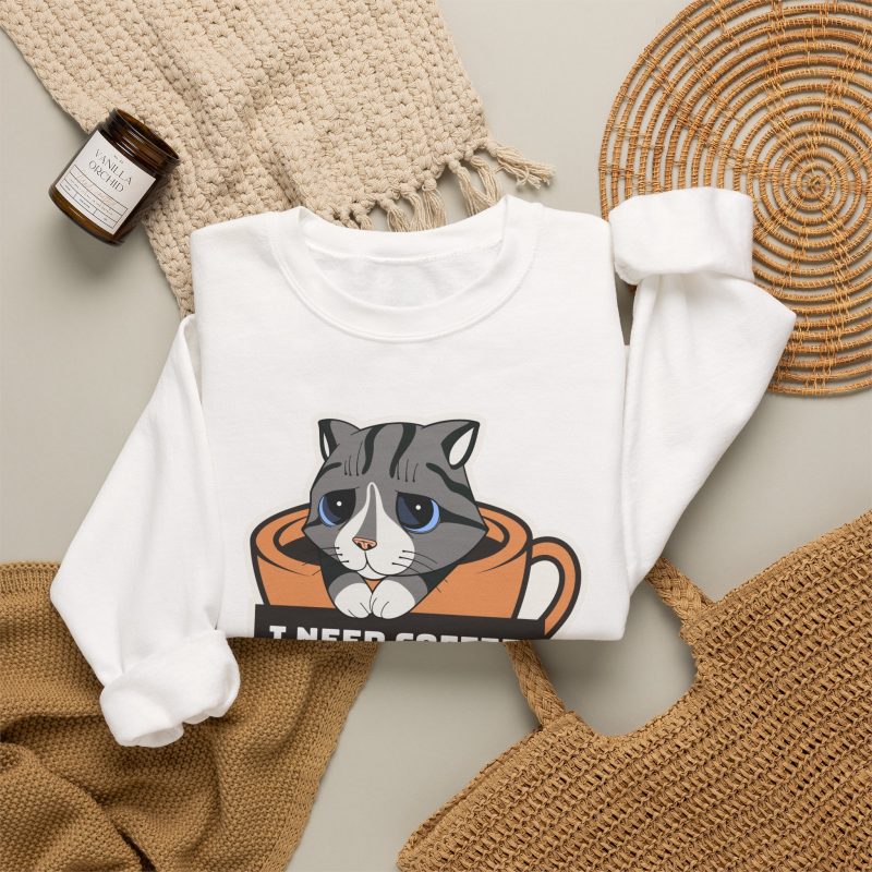Detail of the gray tabby in an orange coffee cup graphic on the crewneck sweatshirt