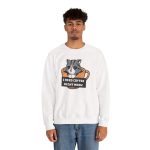 Person wearing a crewneck sweatshirt with a gray tabby in an orange coffee cup graphic on the front