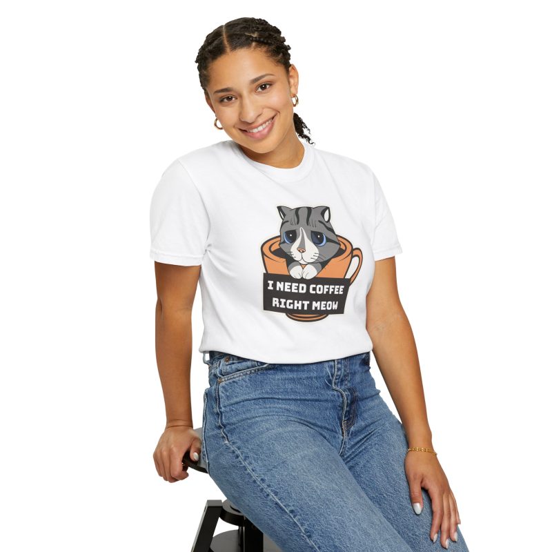 Person wearing a tee with a gray tabby in an orange coffee cup graphic on the front