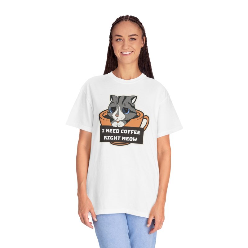Person wearing a tee with a gray tabby in an orange coffee cup graphic on the front