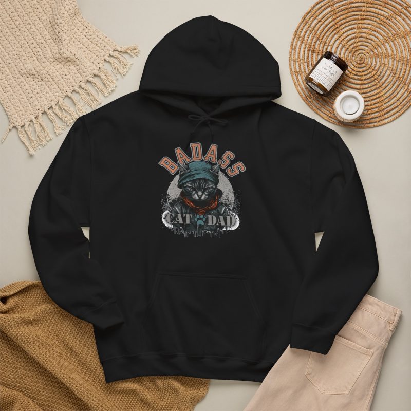 Detail of the tabby in a cap, jacket and scarf graphic on the hoodie