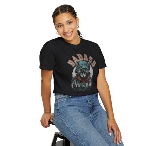 Person wearing a tee with a tabby in a cap, jacket and scarf graphic on the front