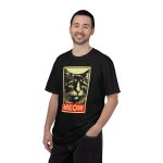 Person wearing a shirt with a bold cat portrait and red panel Person wearing a shirt with a bold cat portrait and red panel