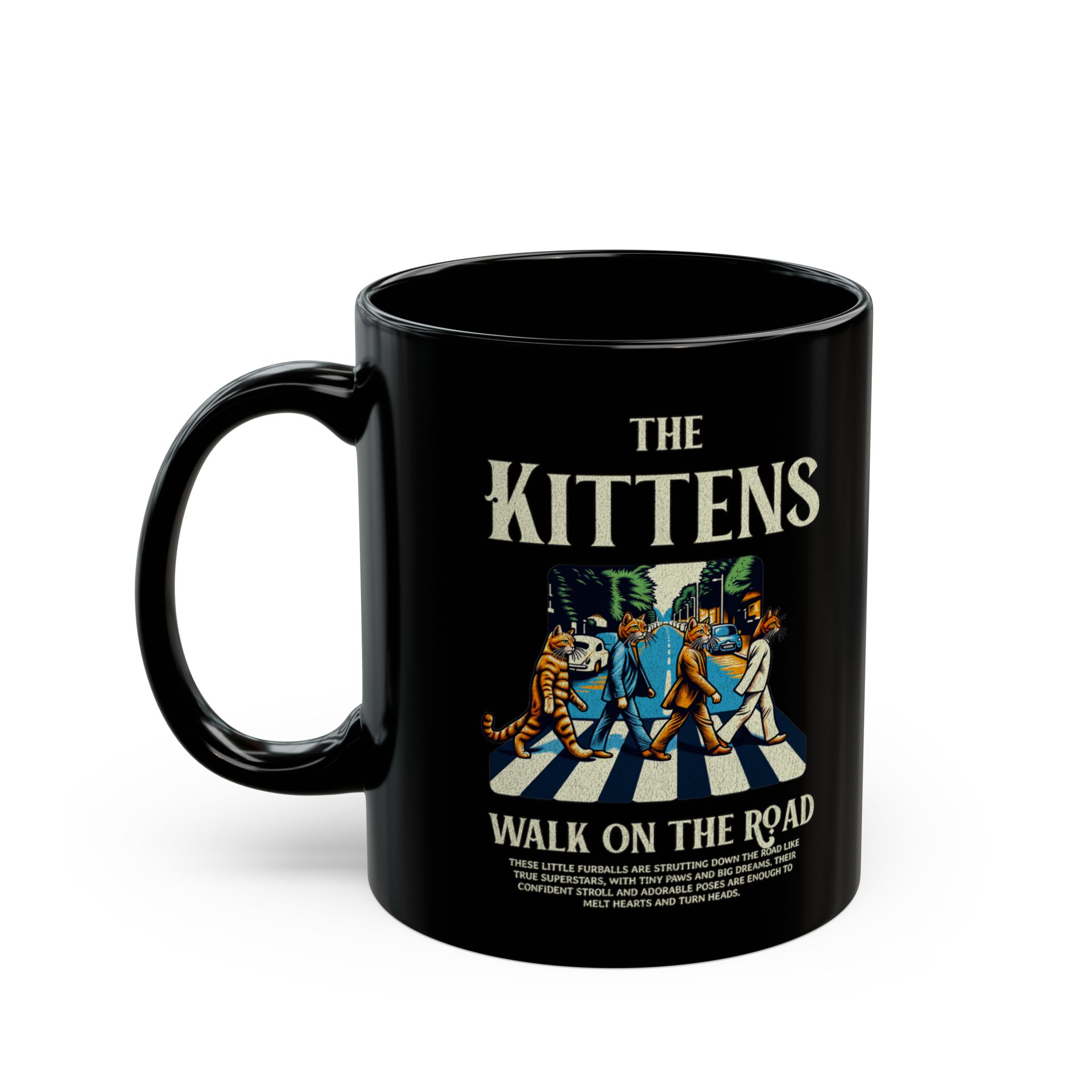 Four tabby cats crossing a street in a vintage illustration printed on a glossy black ceramic mug