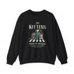 Four tabby cats crossing a street in a vintage illustration printed on the front of a sweatshirt