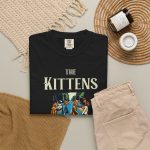 Four tabby cats crossing a street in a vintage illustration with The Kittens Walk on the Road lettering